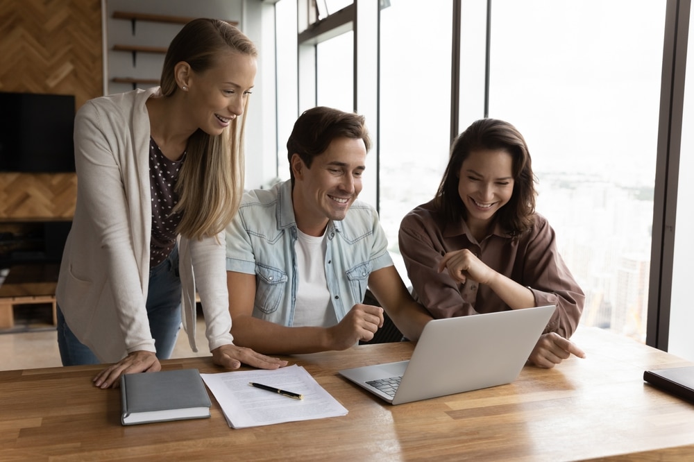 Happy,Business,Team,Watching,Online,Training,Or,Virtual,Presentation,On